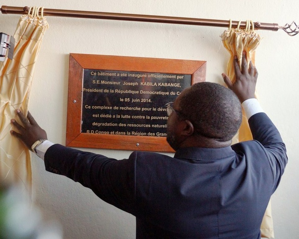 Hon. Jean Chrysostome Vahamwiti, representing President Joseph Kabila  unveiling the commemorative marker of the  Building