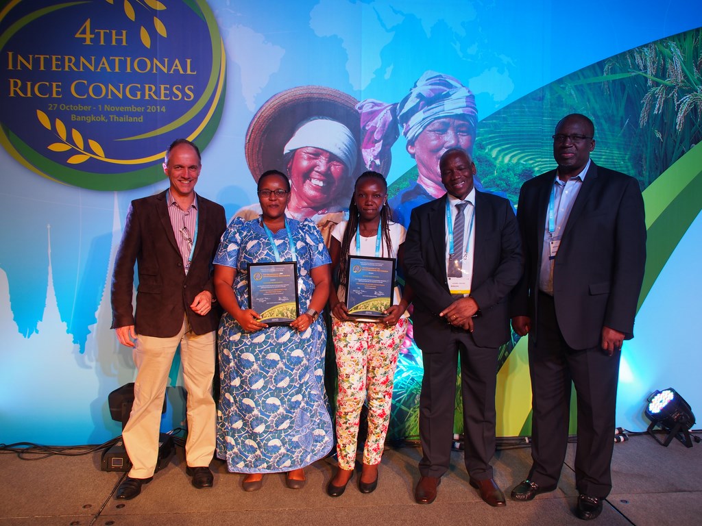 Ms Gaudiose Mujawamariya and Ms Esther Achandi being honored with the Young Rice Scientists Award at the Fourth International Rice Congress 2014 in Bangkok, Thailand.