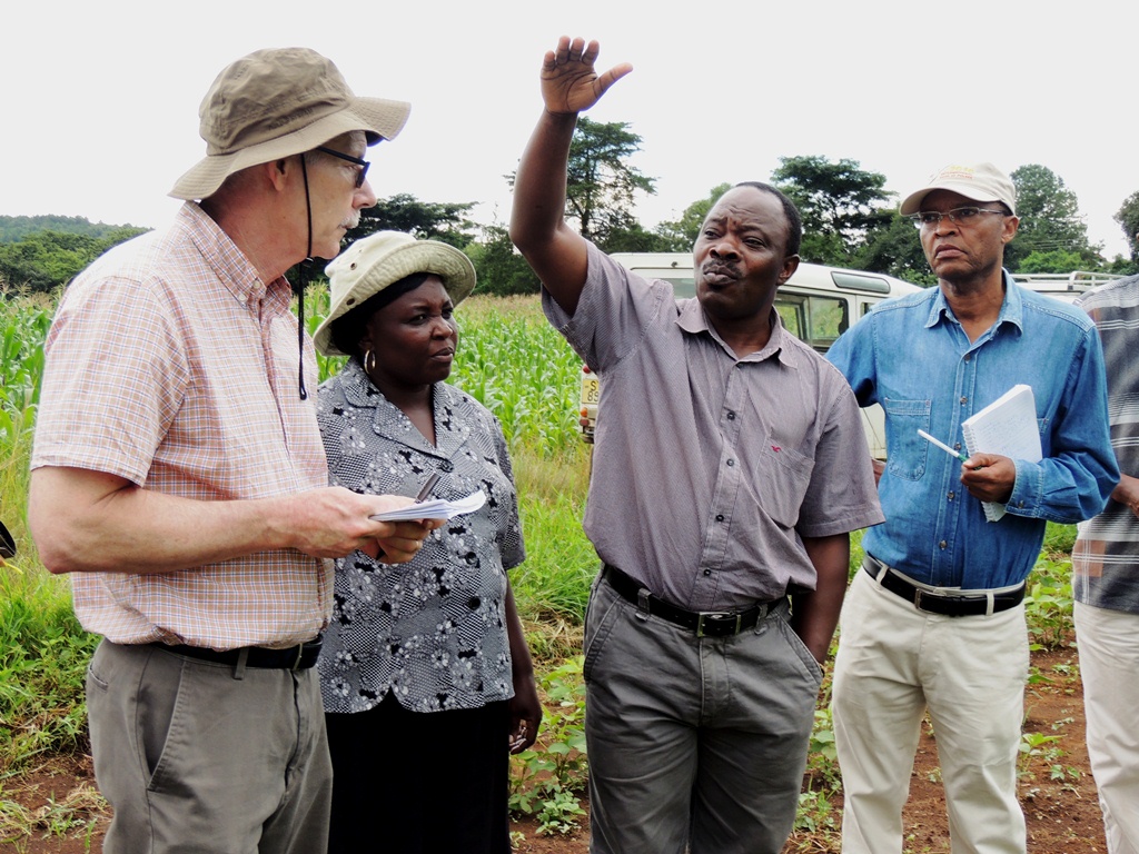 Freddy Baijukya, IITA Agronomist and N2Africa Country Coordinator explaining to the group on the long-term trials