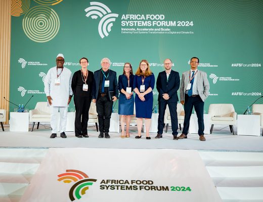 Simeon Ehui and Benard Vanlauwe with delegates who were part of the investing soil health panel at the Africa Food Systems Forum in Kigali.