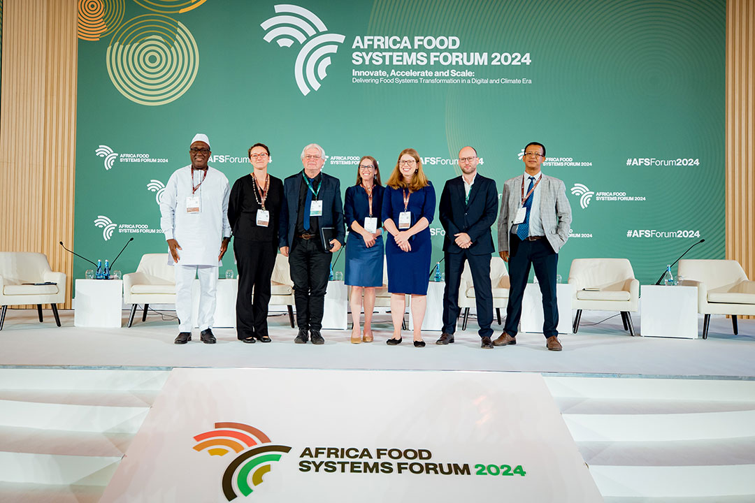 Simeon Ehui and Benard Vanlauwe with delegates who were part of the investing soil health panel at the Africa Food Systems Forum in Kigali.