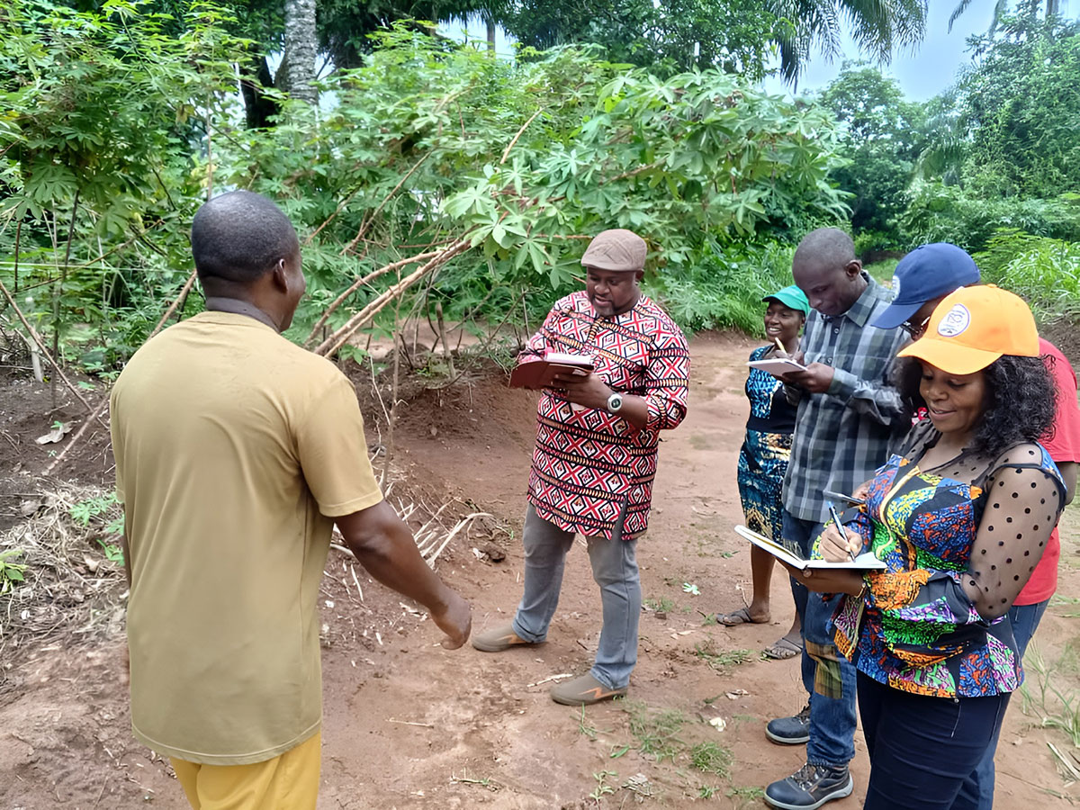 Dr. Anthony Okere and Dr. Maxwell Okoye, engaging with Mr. Chidi Mmeje; one of the farmers in Imo State. Photo Credi Dr. Samuel Onwuka.