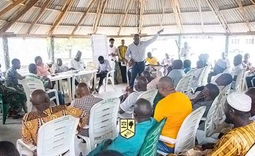 Programme coordinator facilitating a group discussion with JDPC led cassava group in Ibarapa East, Oyo State. Photo Credit: JDPC