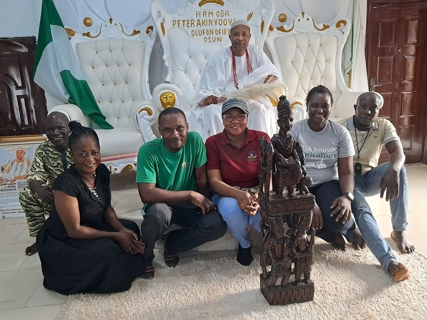 Lead famer, Mr Tajudeen Odeniyi (left), IITA research team, and the community ruler and king to discuss cooperation on multiplication of farmer and processor preferred cassava varieties.