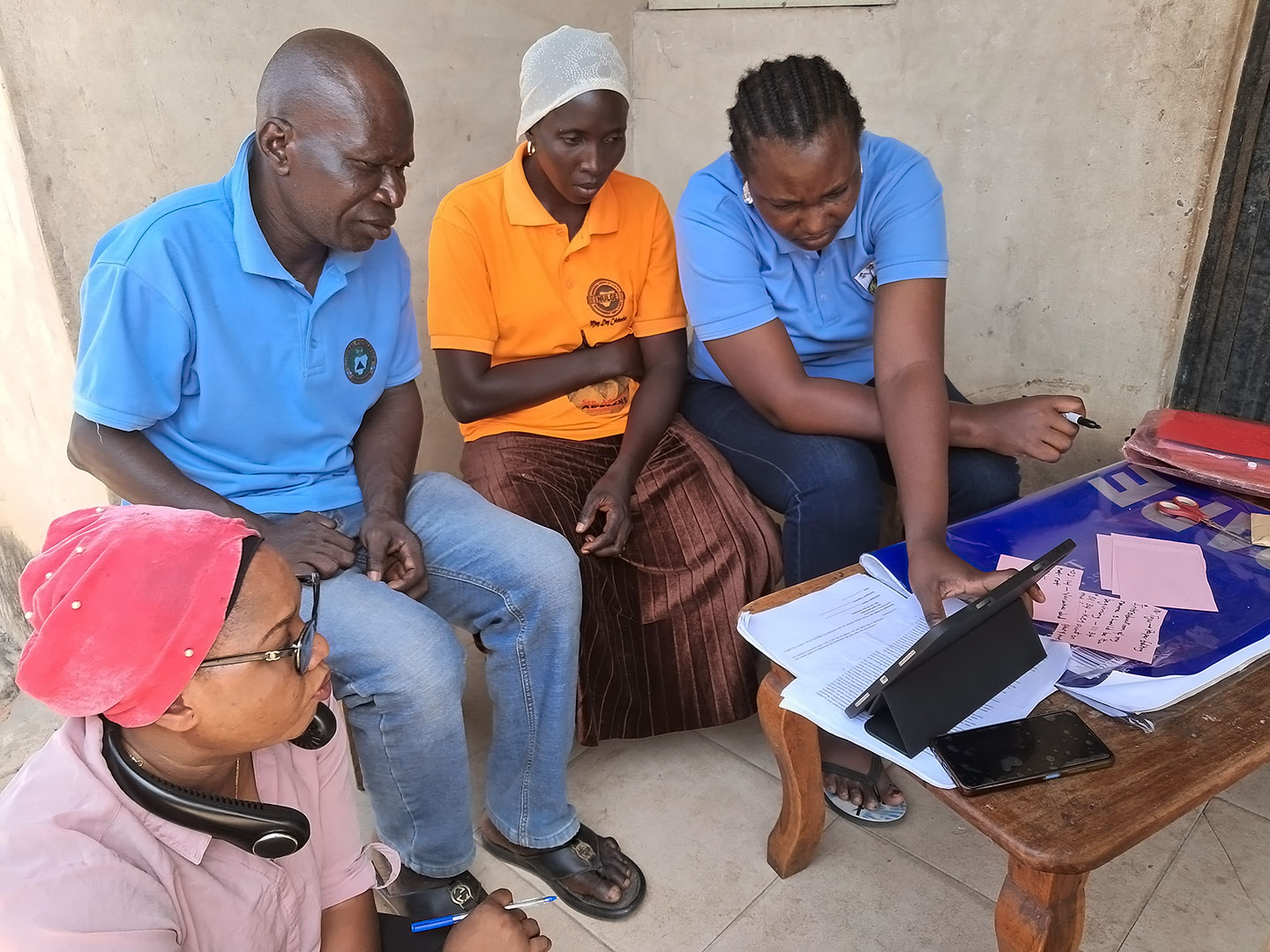 Reflection session and paper editing with a tricot lead farmer Mr Tajudeen Odeniyi and his wife Mrs Fatimah Odeniyi to make the storyboard of a video 