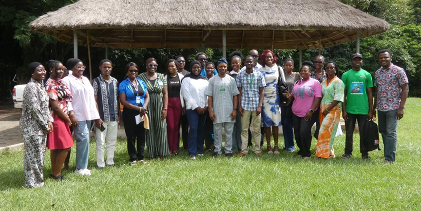 The postgraduate students pose for a group photograph after an engaging and interactive session with the Manager and Staff of IITA Forest Center, Adewale Awoyemi, and Ademola Ajayi.