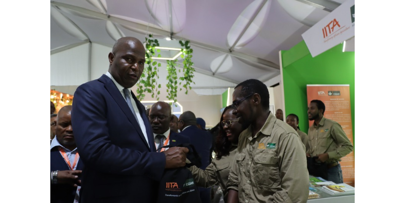 President of Mozambique, His Excellency Daniel Chapo, visiting the IITA stand and encouraging the Institute to keep working